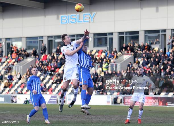 Ryan Bird of Newport County contends for the aerial ball during the Sky Bet League Two match between Newport County and Hartlepool United at Rodney...