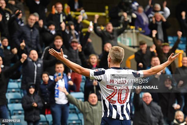 Millwall's English-born Welsh striker Steve Morison celebrates after scoring the opening goal of the English FA Cup fourth round football match...