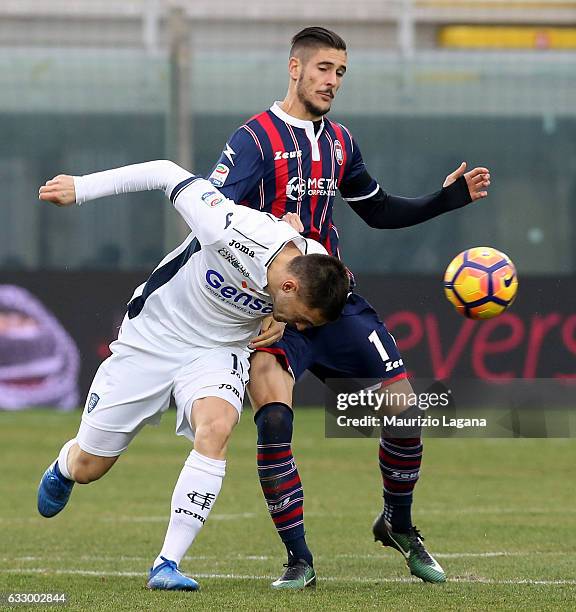 Diego Falcinelli of Crotone competes for the ball with Frederic Veseli of Empoli during the Serie A match between FC Crotone and Empoli FC at Stadio...