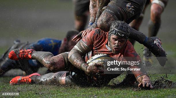 Falcons captain Will Welch is stopped just short of the line during the Anglo- Welsh Cup match between Newport Gwent Dragons and Newcastle Falcons at...