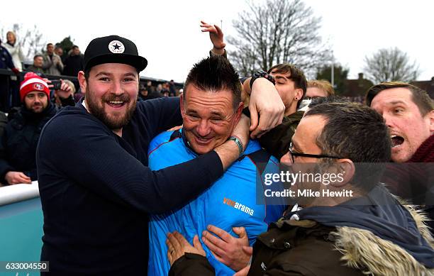 Paul Doswell, Manager of Sutton United celebrates with the Sutton United fans on the pitch after The Emirates FA Cup Fourth Round match between...