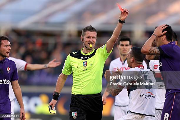 The referee Daniele Orsato shows a red card to Federico Bernardeschi mof ACF Fiorentina during the Serie A match between ACF Fiorentina and Genoa CFC...