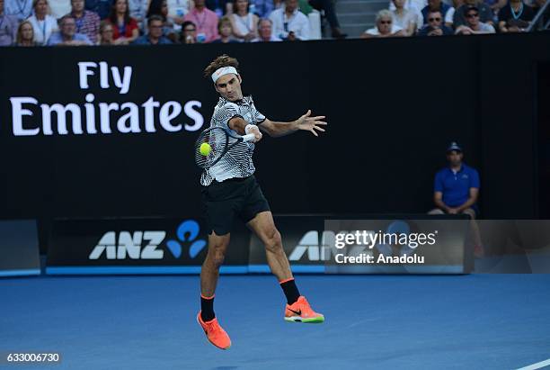 Roger Federer of Switzerland returns the ball in his Australian Open 2017 men's final match against Rafael Nadal of Spain at Rod Laver Arena, in...