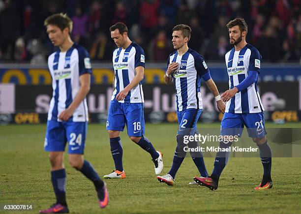 Genki Haraguchi, Julian Schieber, Peter Pekarik and Marvin Plattenhardt of Hertha BSC leave the pitch after the Bundesliga match between Sport Club...