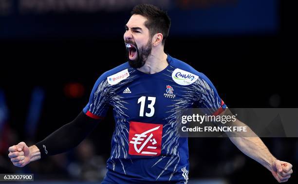 France's centre back Nikola Karabatic celebrattes after opening the scoring during the 25th IHF Men's World Championship 2017 final handball match...