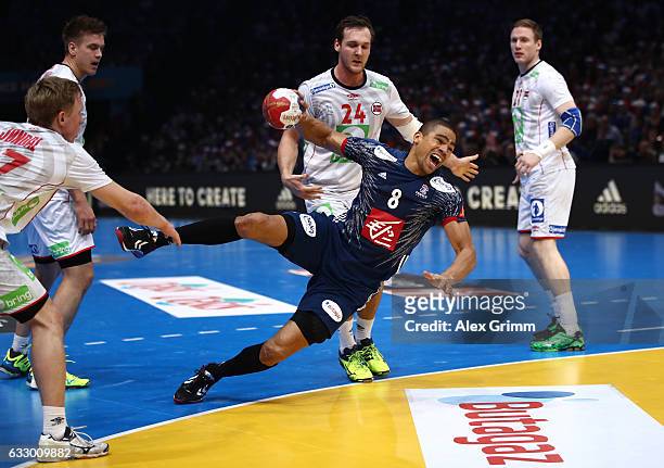 Daniel Narcisse of France goes to ground as he shoots during the 25th IHF Men's World Championship 2017 Final between France and Norway at...
