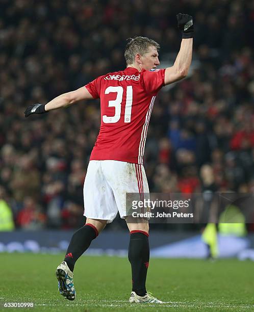 Bastian Schweinsteiger of Manchester United celebrates scoring their fourth goal during the Emirates FA Cup Fourth Round match between Manchester...