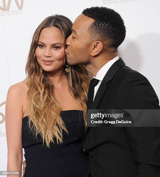 Chrissy Teigen and singer John Legend arrive at the 28th Annual Producers Guild Awards at The Beverly Hilton Hotel on January 28, 2017 in Beverly...