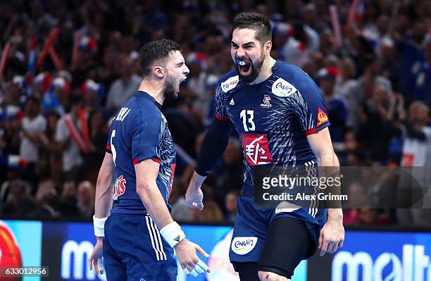 Nikola Karabatic and Nedim Remili of France celebrate victory during the 25th IHF Men's World Championship 2017 Final between France and Norway at...