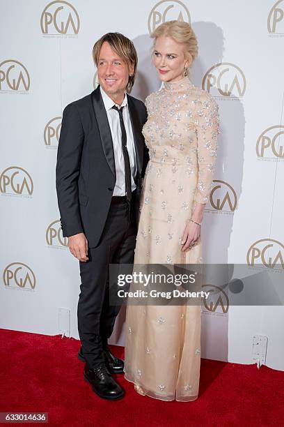 Keith Urban and Nicole Kidman arrive for the 28th Annual Producers Guild Awards at The Beverly Hilton Hotel on January 28, 2017 in Beverly Hills,...