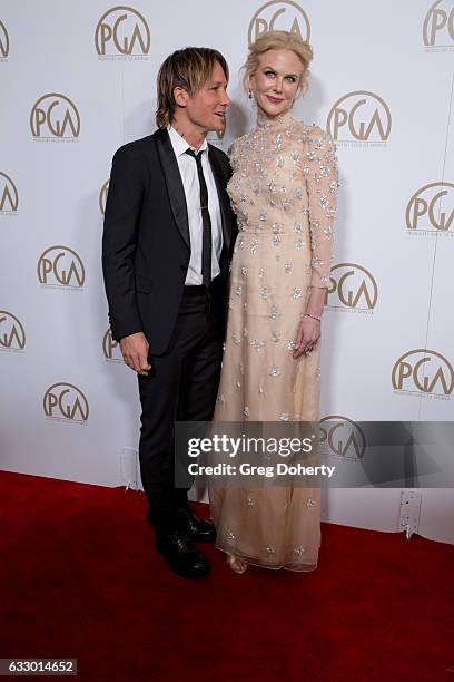 Keith Urban and Nicole Kidman arrive for the 28th Annual Producers Guild Awards at The Beverly Hilton Hotel on January 28, 2017 in Beverly Hills,...