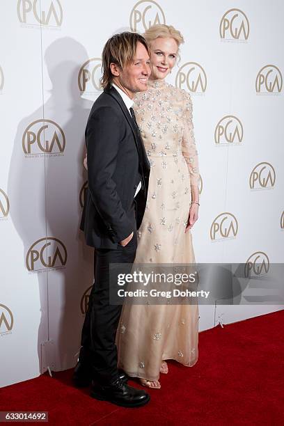 Keith Urban and Nicole Kidman arrive for the 28th Annual Producers Guild Awards at The Beverly Hilton Hotel on January 28, 2017 in Beverly Hills,...