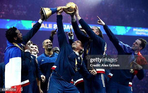 French players lift the trophy after victory during the 25th IHF Men's World Championship 2017 Final between France and Norway at Accorhotels Arena...