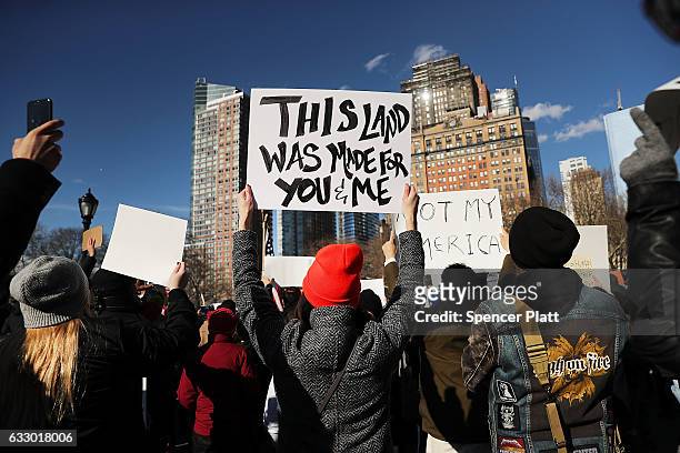 People attend an afternoon rally in Battery Park to protest U.S. President Donald Trump's new immigration policies on January 29, 2017 in New York...