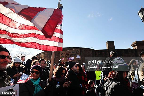 People attend an afternoon rally in Battery Park to protest U.S. President Donald Trump's new immigration policies on January 29, 2017 in New York...