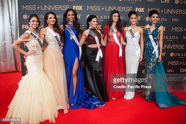 Candidates from New Zealand, Hungary, Curacao, Malta, Italy, Kosovo, and Mexico pose for pictures at the SMX in Pasay City. Miss Universe candidates...