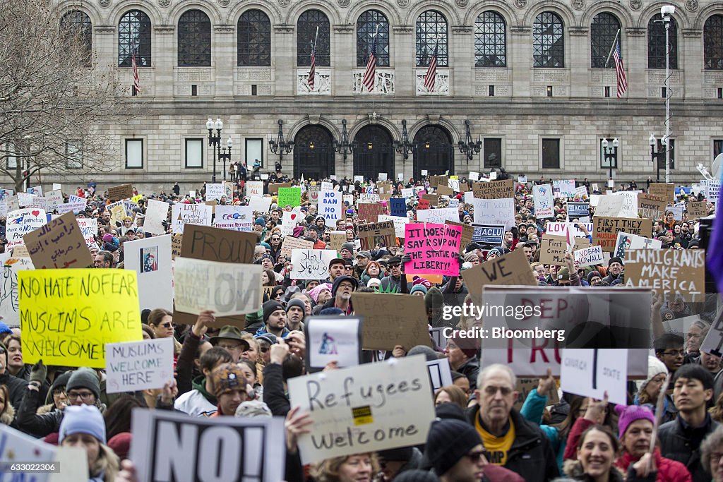 Demonstrators Protest At Copley Square As Confusion Grips Airports Amid Courts Halt Of Trump