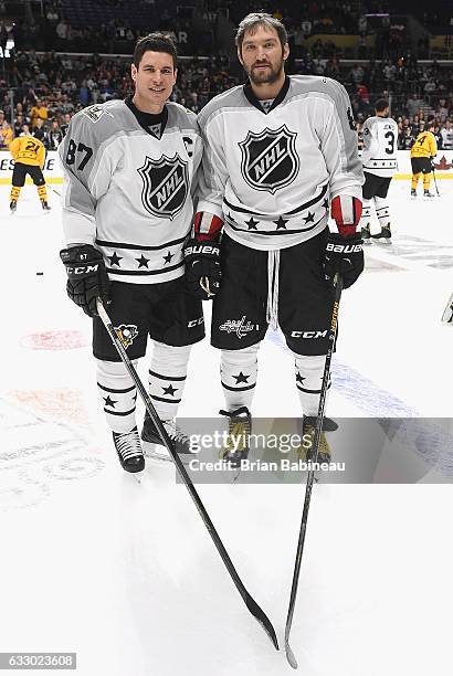 Sidney Crosby of the Pittsburgh Penguins and Alex Ovechkin of the Washington Capitals pose for a photo during warm-up prior to the 2017 Honda NHL...