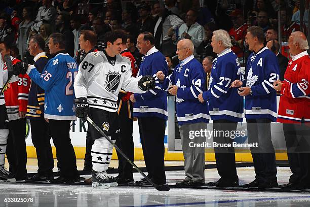 Sidney Crosby of the Pittsburgh Penguins greets members of the NHL 100 prior to the 2017 Honda NHL All-Star Game at Staples Center on January 29,...