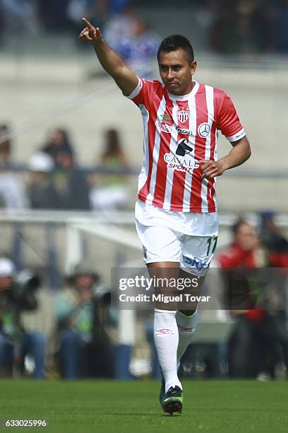 Jesus Isijara of Necaxa celebrates after scoring the first goal of his team during the 4th round match between Pumas UNAM and Necaxa as part of the...