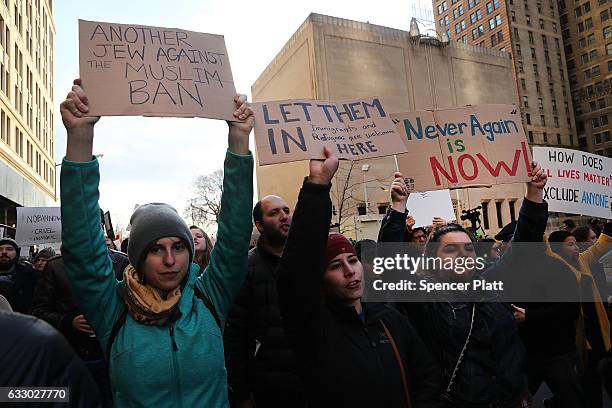 People march in lower Manhattan to protest U.S. President Donald Trump's new immigration policies on January 29, 2017 in New York City. Trump's...