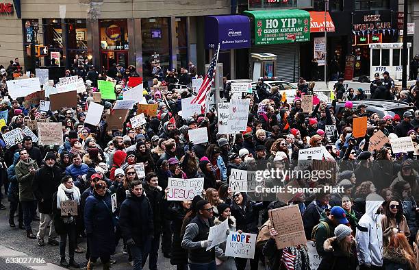 People march in lower Manhattan to protest U.S. President Donald Trump's new immigration policies on January 29, 2017 in New York City. Trump's...