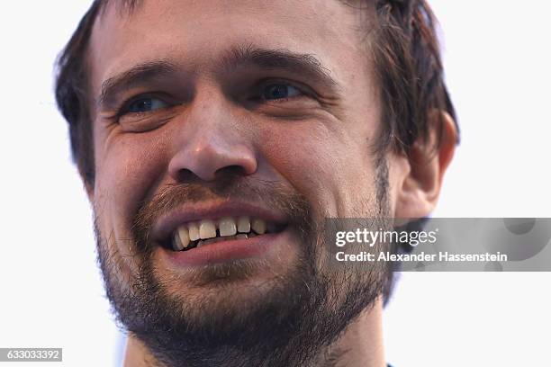 Alexander Tretiakov of Russia looks on after the Men's Skeleton second run of the BMW IBSF World Cup at Deutsche Post Eisarena Koenigssee on January...