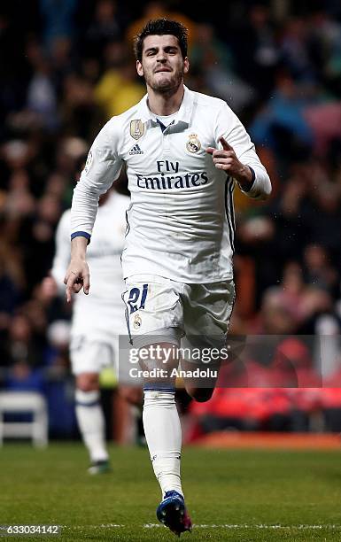 Alvaro Morata of Real Madrid celebrates after scoring a goal during the La Liga soccer match between Real Madrid CF and Real Sociedad at Santiago...