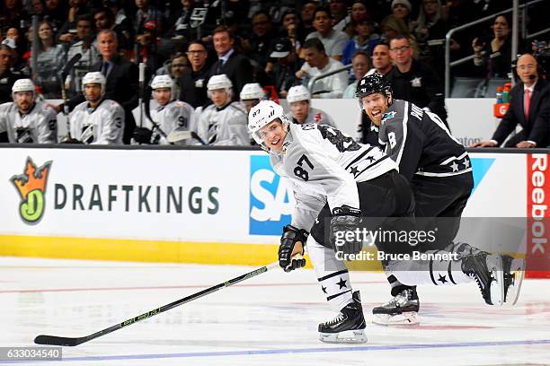 Sidney Crosby of the Pittsburgh Penguins and Joe Pavelski of the San Jose Sharks react during the 2017 Honda NHL All-Star Tournament Final between...