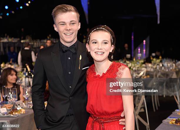 Actors Nicholas Hamilton and Millie Bobby Brown attend the 23rd Annual Screen Actors Guild Awards Cocktail Reception at The Shrine Expo Hall on...