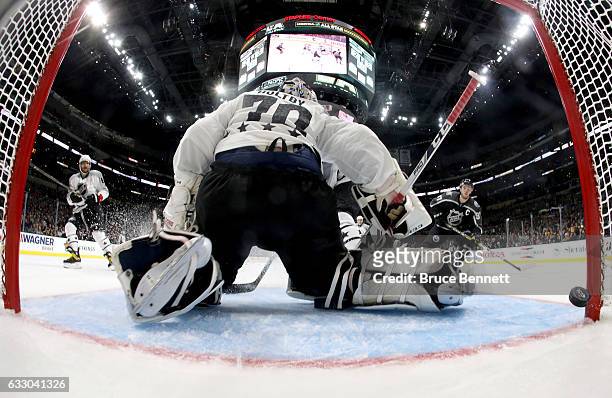 Braden Holtby of the Washington Capitals is unable to make a save during the 2017 Honda NHL All-Star Tournament Final between the Pacific Division...