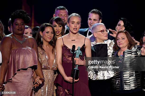 Actor Taylor Schilling and cast of 'Orange Is the New Black' accept Outstanding Performance by an Ensemble in a Comedy Series onstage during The 23rd...