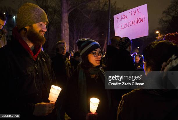 Demonstrators gather during a vigil near the Naval Observatory on January 29, 2017 in Washington, DC. Protestors in Washington and around the country...