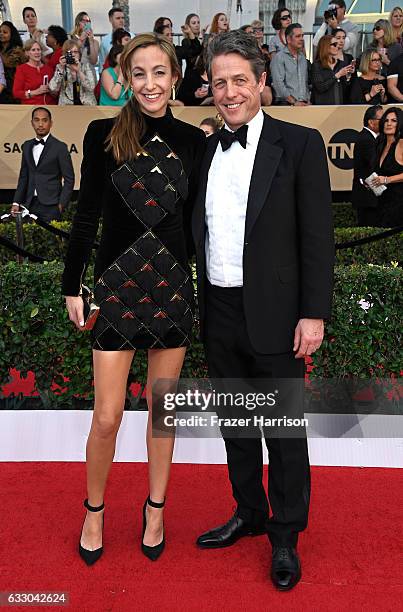 Anna Eberstein and actor Hugh Grant attend The 23rd Annual Screen Actors Guild Awards at The Shrine Auditorium on January 29, 2017 in Los Angeles,...