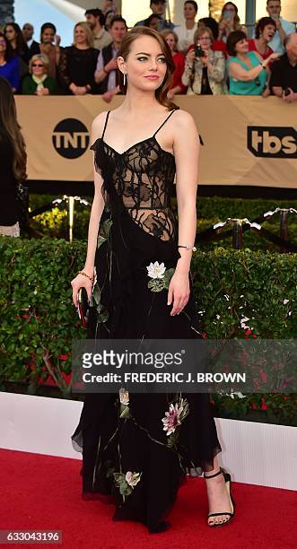 Actress Emma Stone arrives for the 23rd Annual Screen Actors Guild Awards at the Shrine Exposition Center on January 29 in Los Angeles, California. /...
