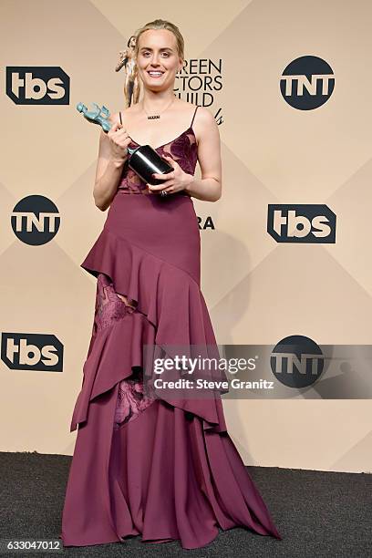 Actor Taylor Schilling, winner of the Outstanding Ensemble in a Comedy Series award of 'Orange Is the New Black,' pose in the press room during the...