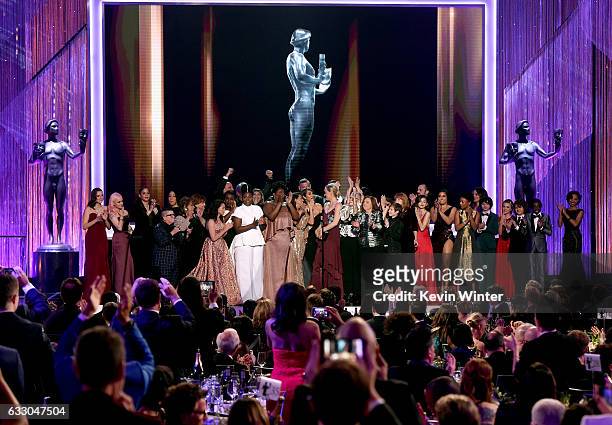 Actress Taylor Schilling and the cast of 'Orange Is the New Black' accept the award for Outstanding Performance by an Ensemble in a Comedy Series...