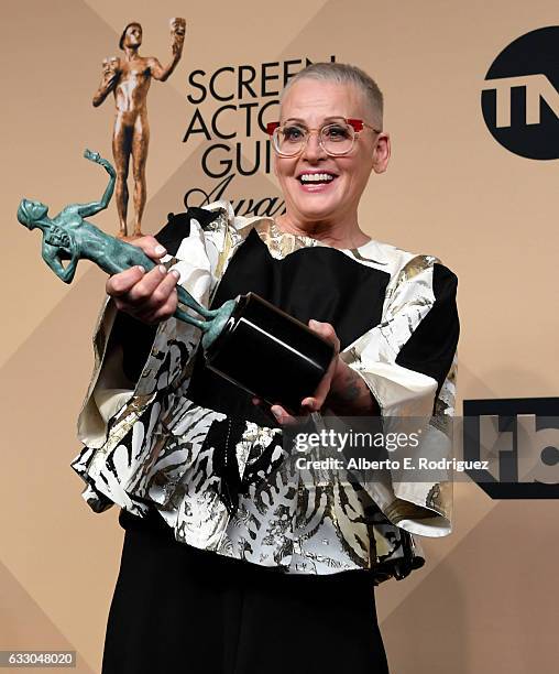 Actor Lori Petty, winner of the Outstanding Ensemble in a Comedy Series award for 'Orange Is the New Black,' poses in the press room during the 23rd...