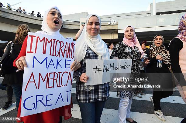Protesters rally against the Muslim immigration ban imposed by U.S. President Donald Trump at Los Angeles International Airport on January 29, 2017...