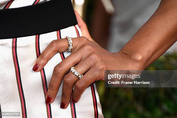 Actor Naomie Harris, ring, manicure, and fashion details, attends The 23rd Annual Screen Actors Guild Awards at The Shrine Auditorium on January 29,...