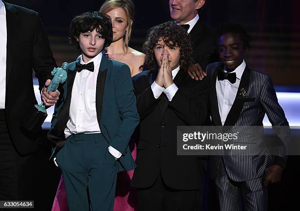 Actors Finn Wolfhard, Gaten Matarazzo and Caleb McLaughlin of 'Stranger Things' accept Outstanding Performance by an Ensemble in a Drama Series...