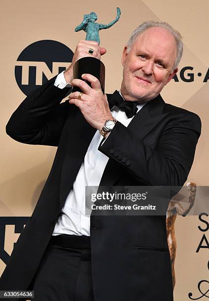 ActorJohn Lithgow, winner of the Outstanding Male Actor in a Drama Series for 'The Crown,' poses in the press room during the 23rd Annual Screen...