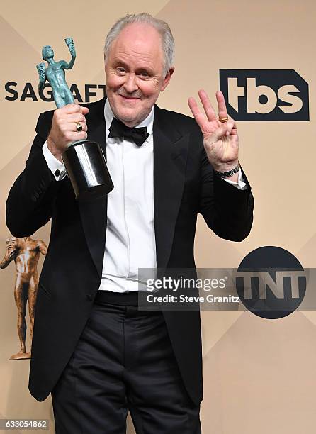 ActorJohn Lithgow, winner of the Outstanding Male Actor in a Drama Series for 'The Crown,' poses in the press room during the 23rd Annual Screen...