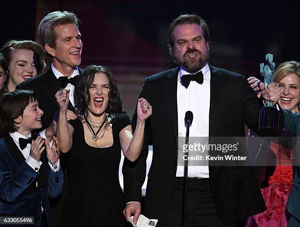 Winona Ryder and David Harbour of 'Stranger Things' accept the Outstanding Performance by an Ensemble in a Drama Series onstage during The 23rd...