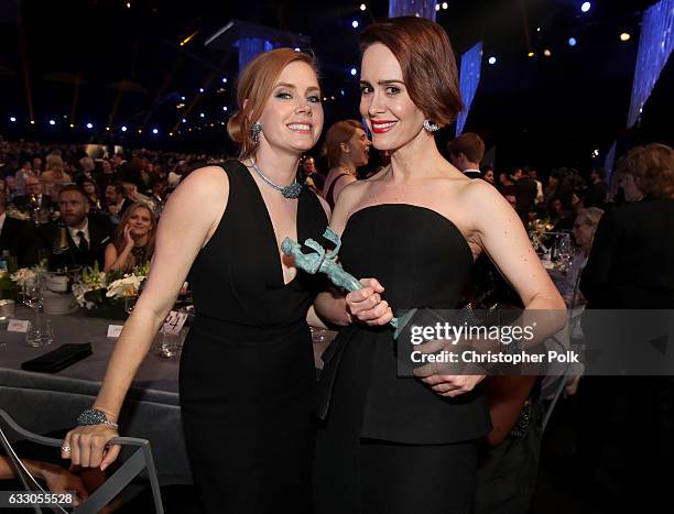 Actors Amy Adams and Sarah Paulson, winner of the award for Female Actor in a Television Movie or Limited Series, during The 23rd Annual Screen...