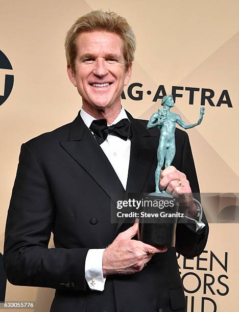 Actor Matthew Modine, winner of the Outstanding Ensemble in a Drama Series award for 'Stranger Things,' poses in the press room during the 23rd...