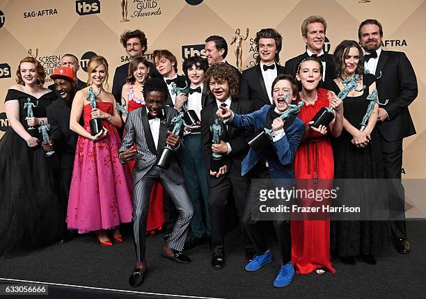 Stranger Things,' cast members, recipients of the Outstanding Performance by an Ensemble in a Drama Series award, pose in the press room during The...