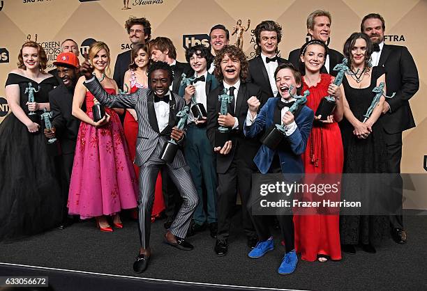 Stranger Things,' cast members, recipients of the Outstanding Performance by an Ensemble in a Drama Series award, pose in the press room during The...