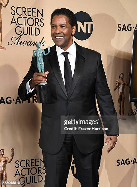 Actor Denzel Washington, recipient of Outstanding Performance by a Male Actor in a Leading Role for 'Fences' Award poses in the press room at The...