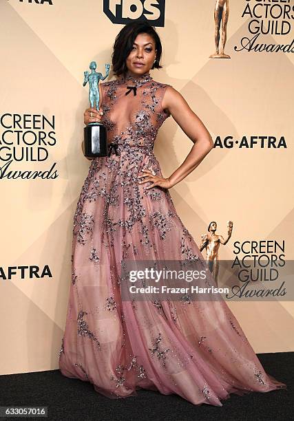 Actor Taraji P. Henson, co-recipient of the Outstanding Performance by a Cast in a Motion Picture award for 'Hidden Figures,' poses in the press room...